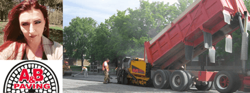 Dump truck on street with paving crew