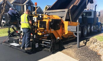 Paving crew working on road